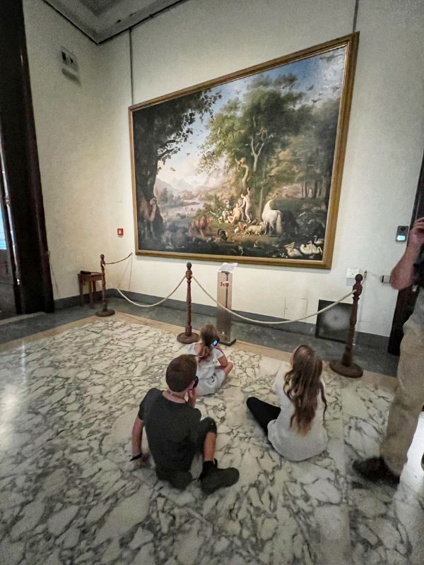 Kids listening to audio guide